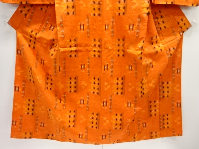  幾何学模様織出し手織り紬着物